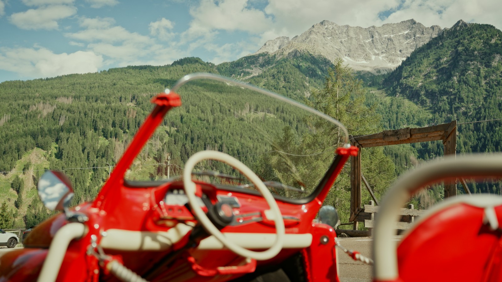 Chalet al Foss — vintage car in the alpine meadow