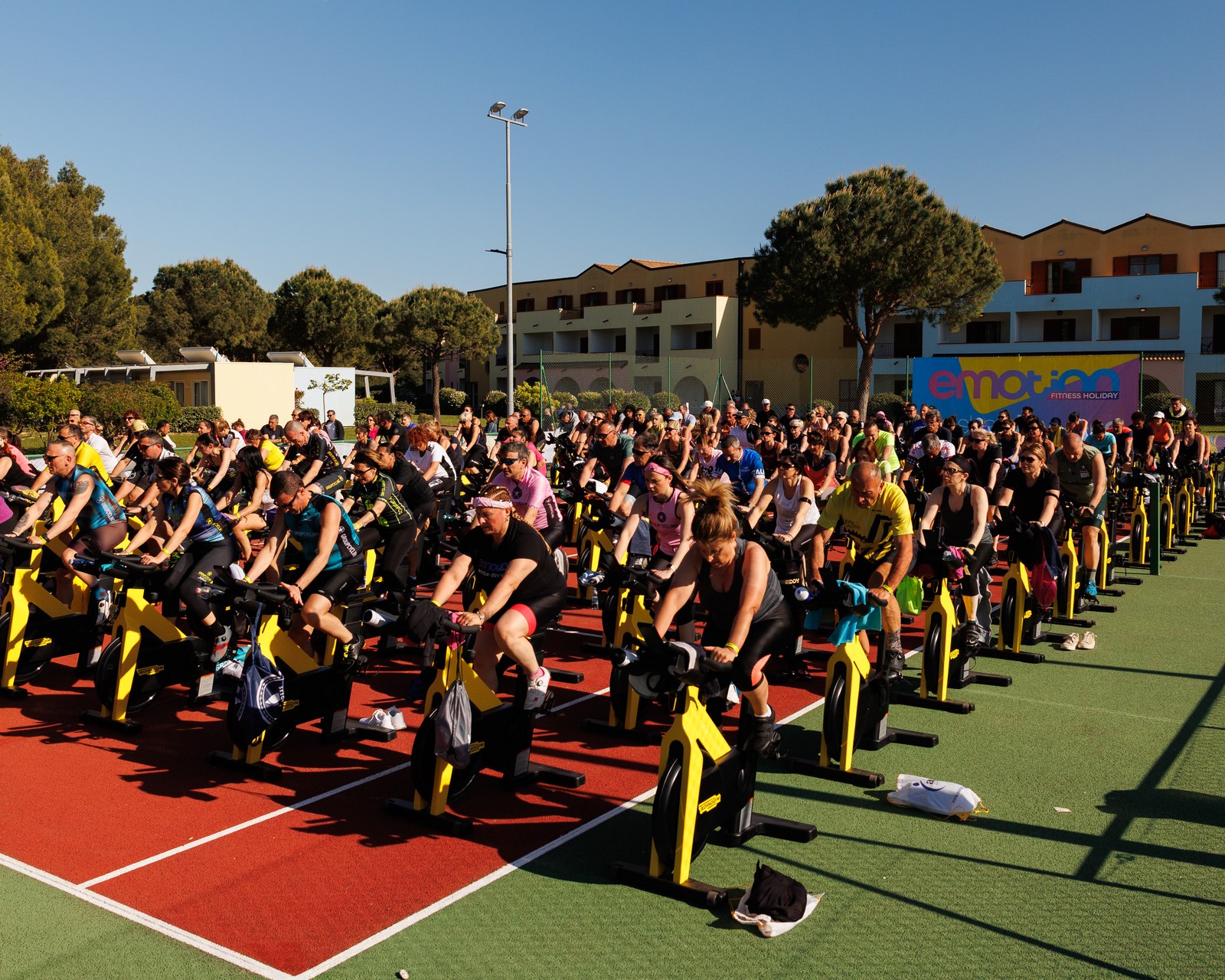 Emotion Fitness — An outdoor spin class running at full capacity