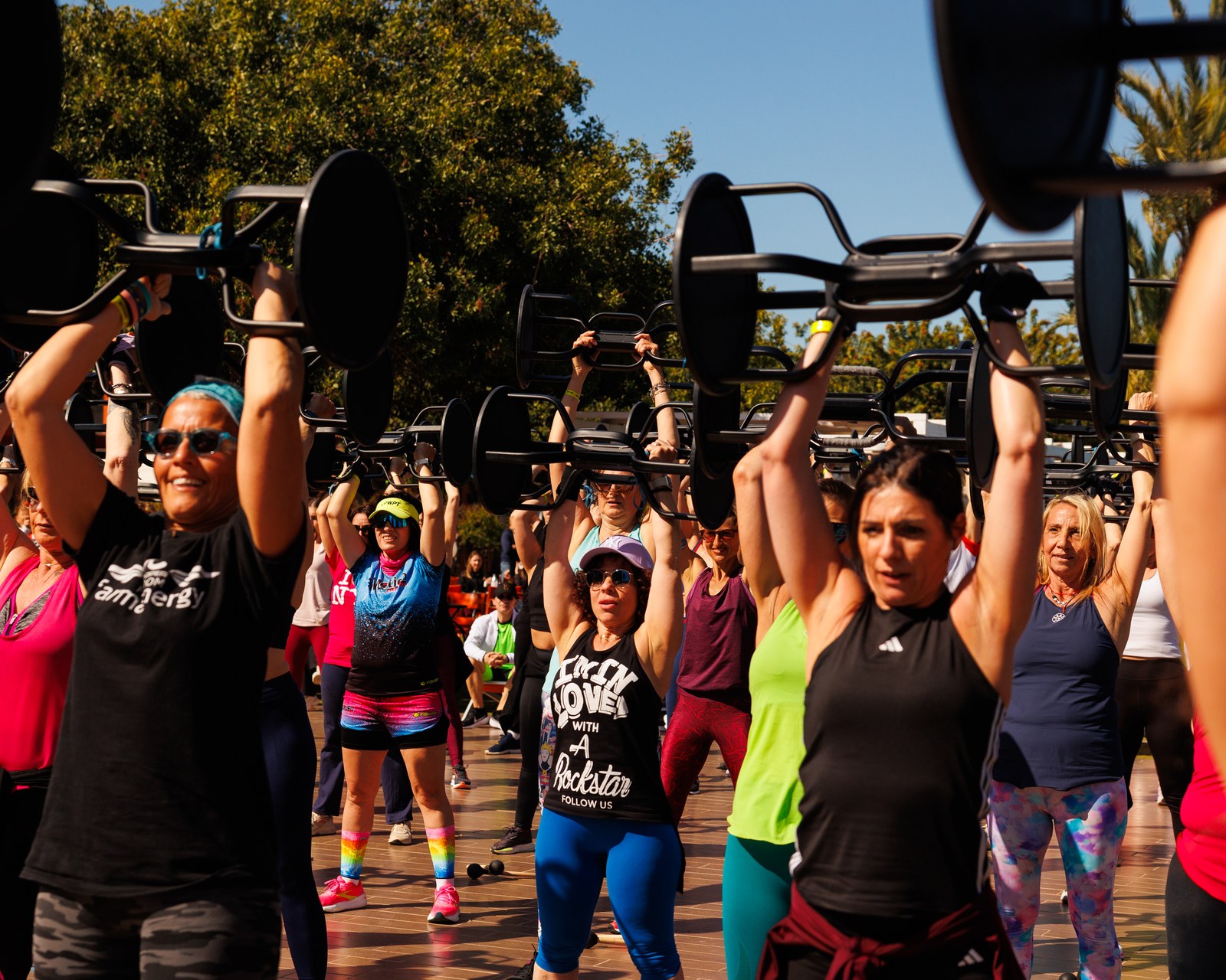 Emotion Fitness — Weights lifted in unison during a group set